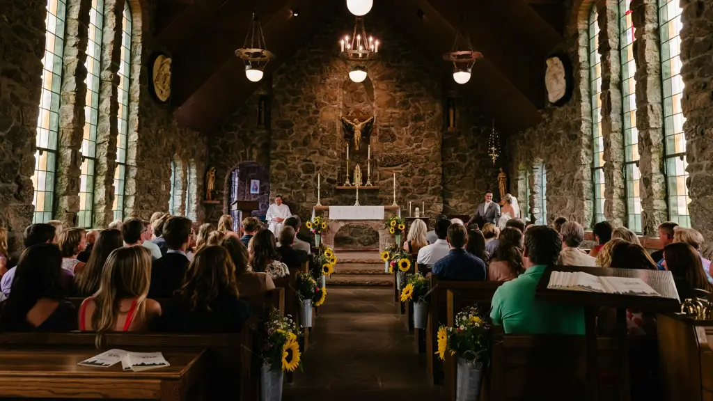 A congregation seated in a stone church during a service